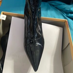 Patent black pointy toe boots. Mid calf